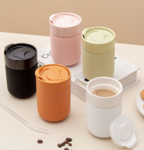 factocy wholesales promotion porcelain tea cup set taza gift travel with silicone lid creative ceramic coffee mug (copy)